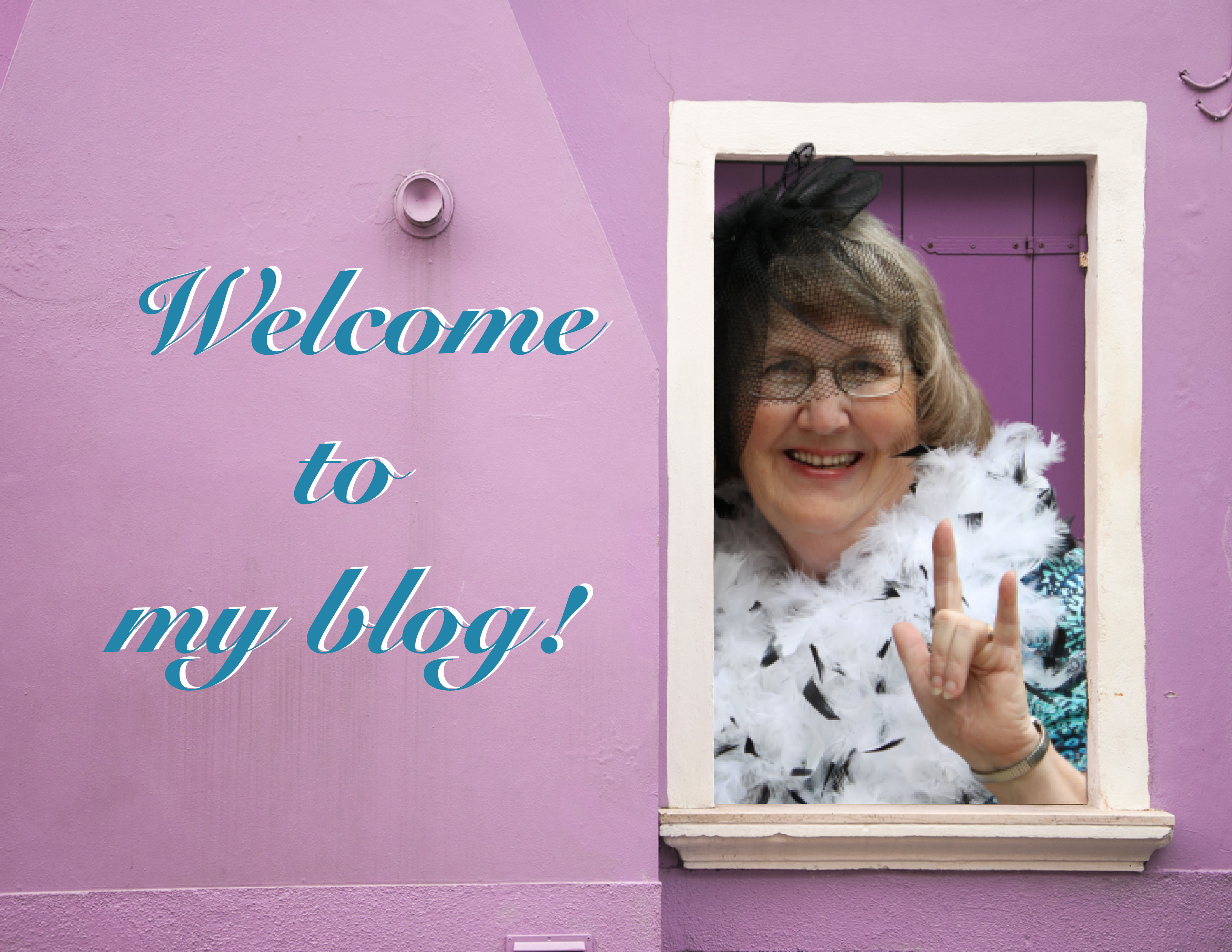 Picture of me in a feather boa and fascinators signing I love you. Welcome to my blog